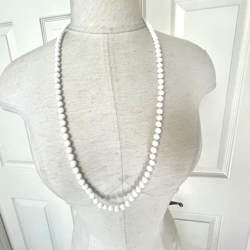 Long white beaded vintage necklace